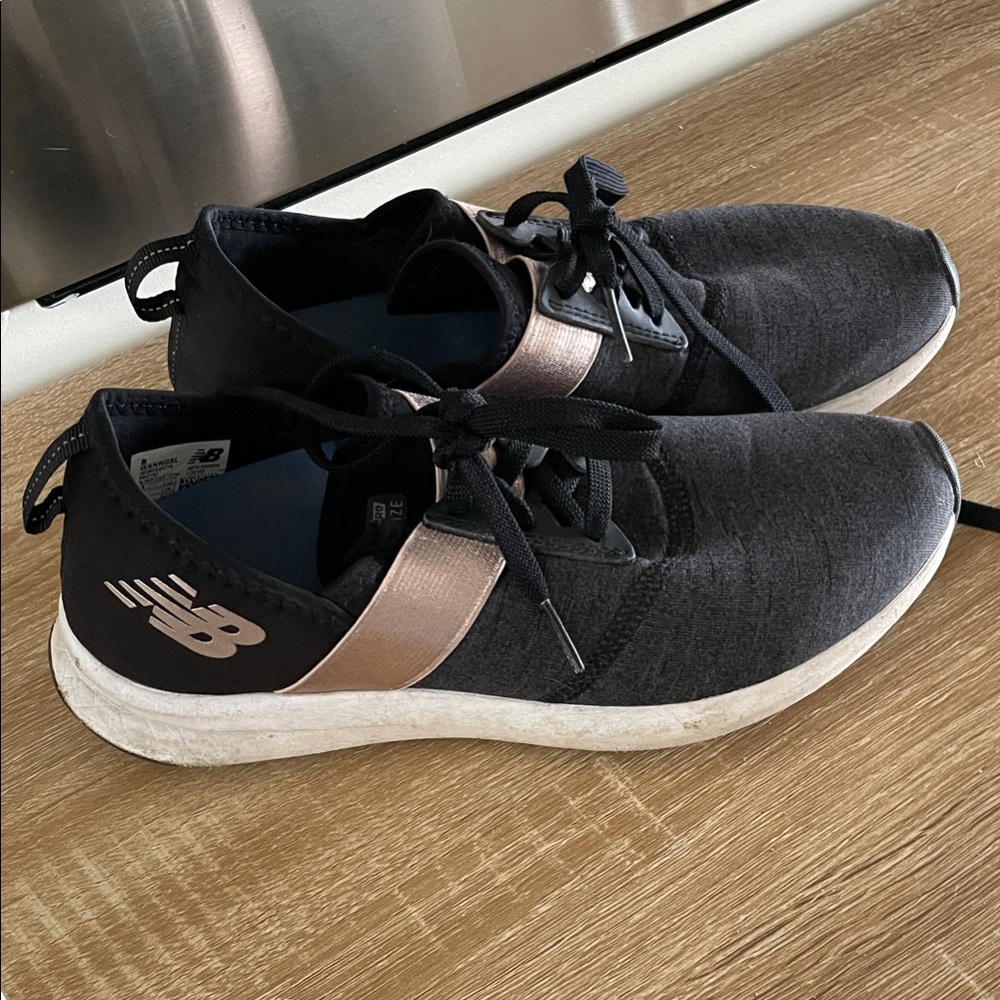 New Balance Black and Bronze Athletic Shoes